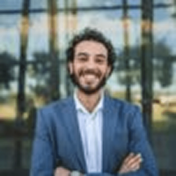 Businessman with curly hair smiling