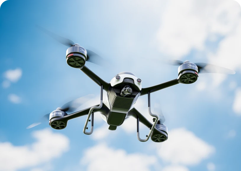 Drone flying against blue sky
