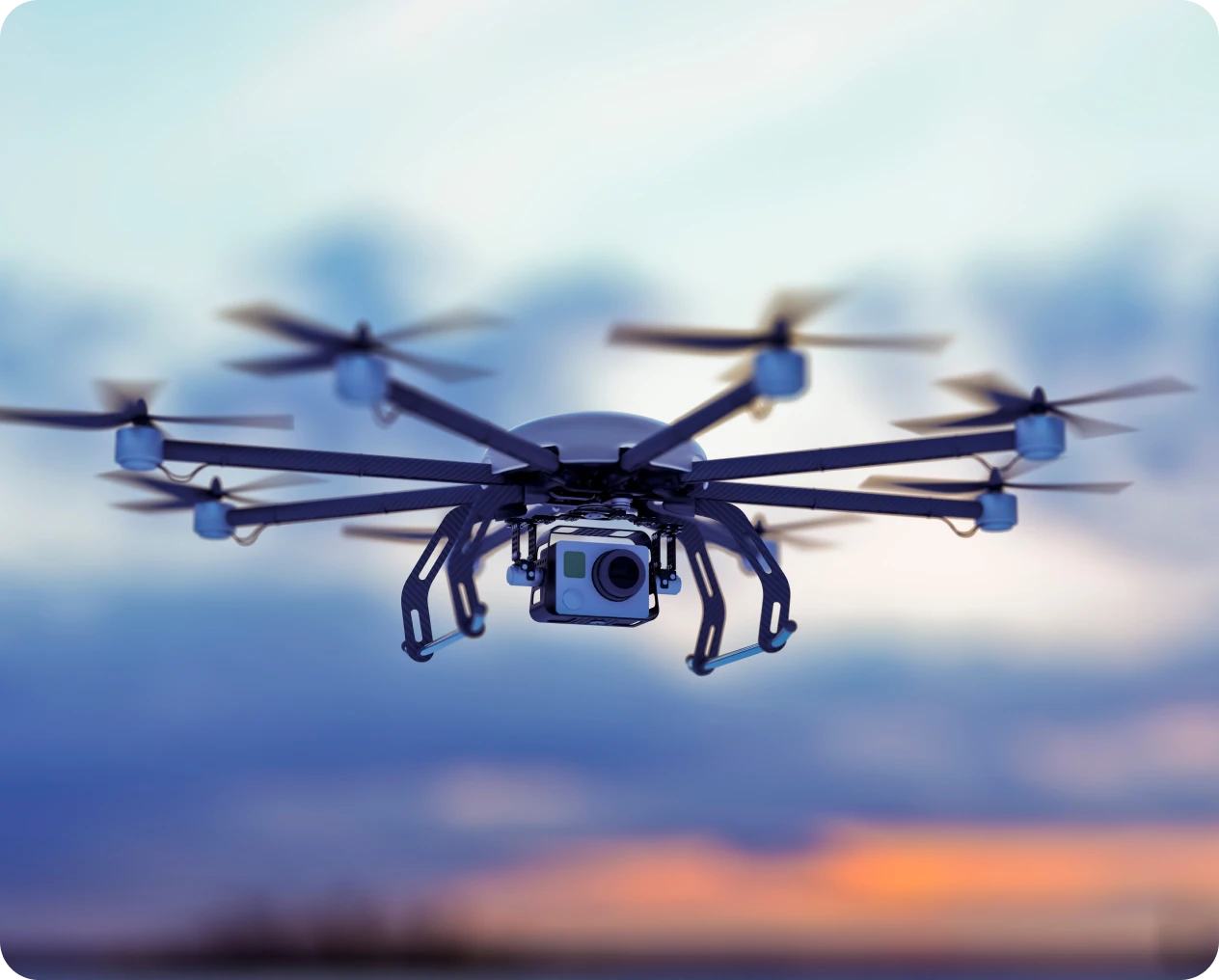 Drone flying at sunset